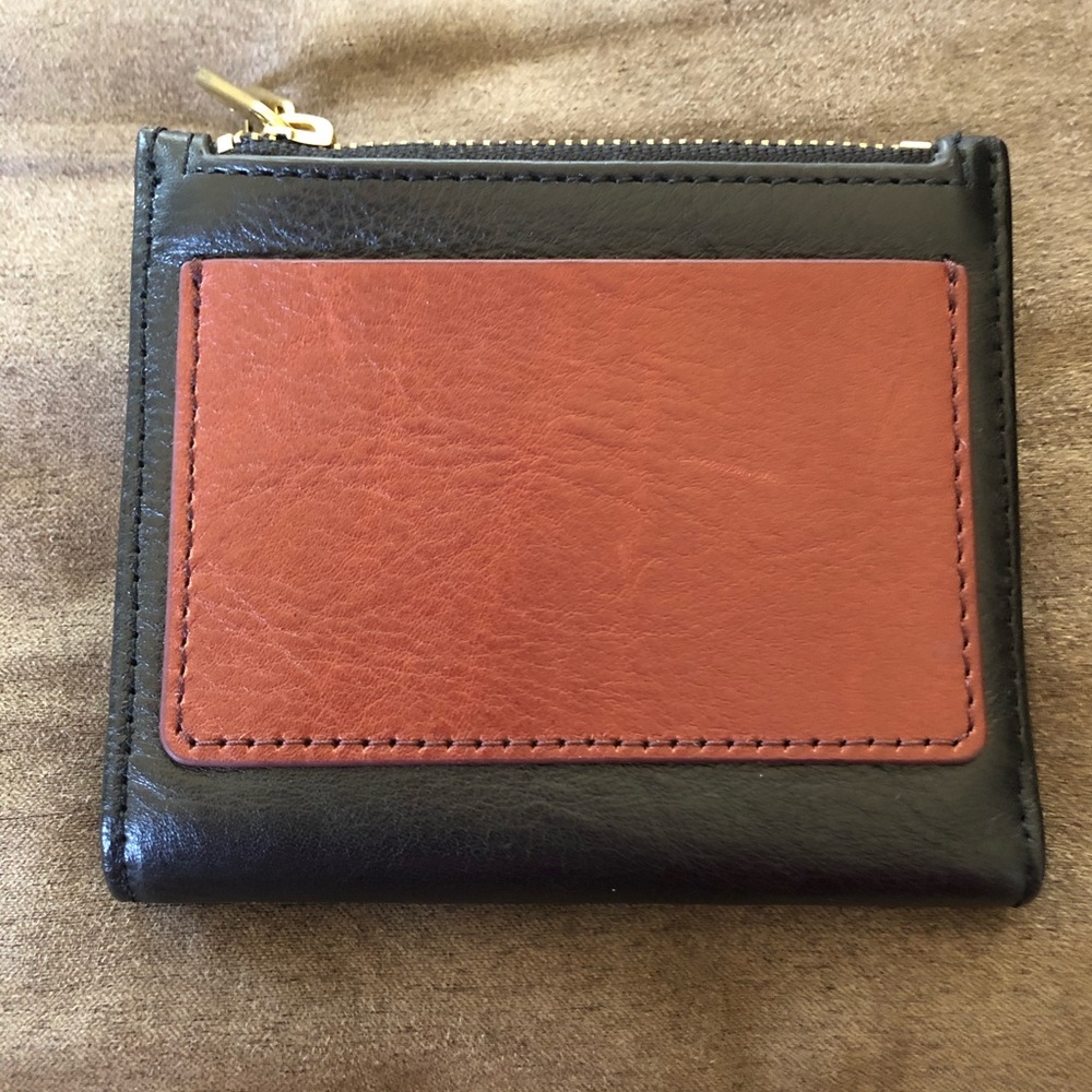 Small fossil leather wallet